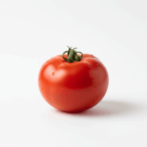 Fresh tomato, whole and sliced, on white background